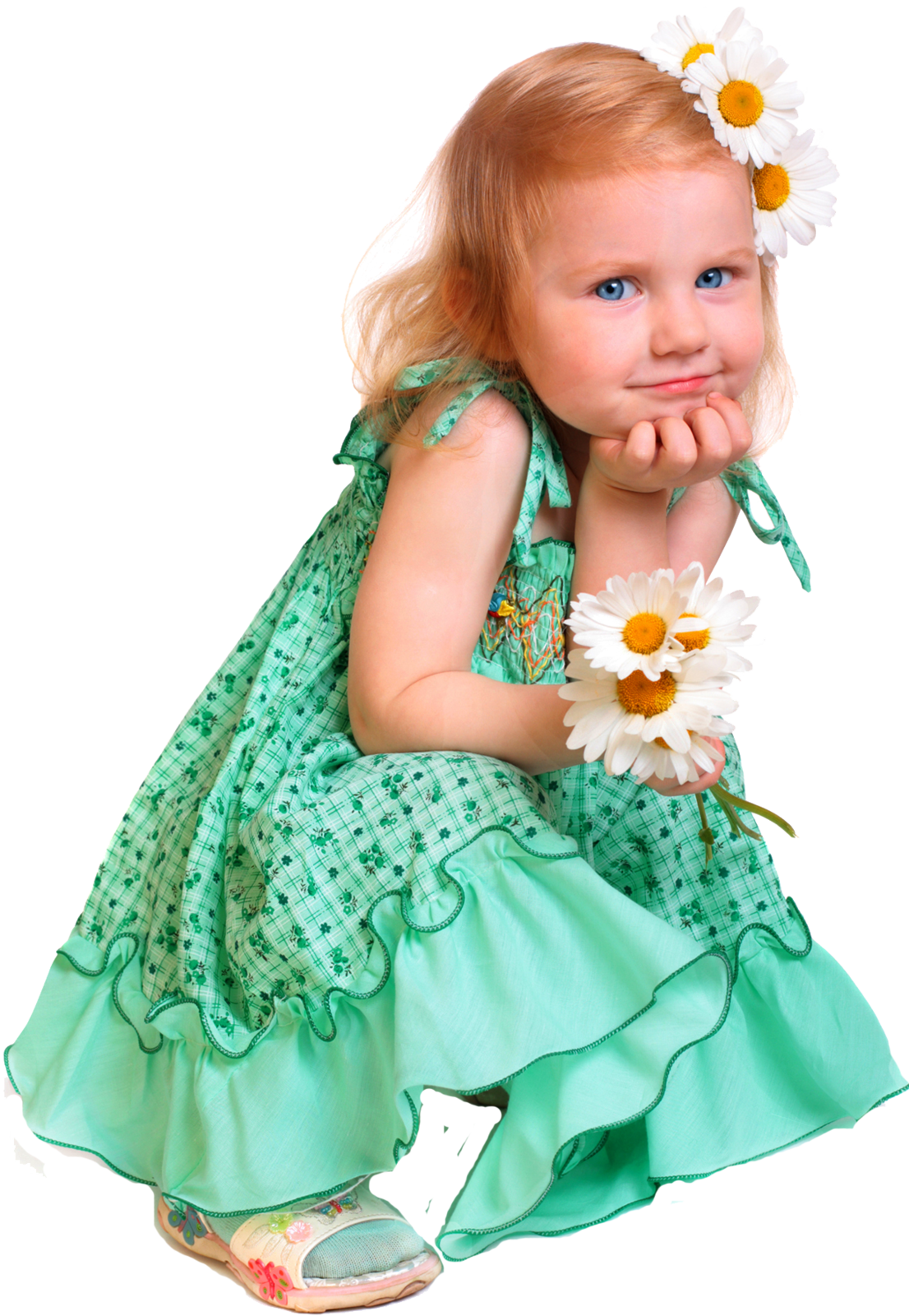 A girl sitting with a white flower in her hand 